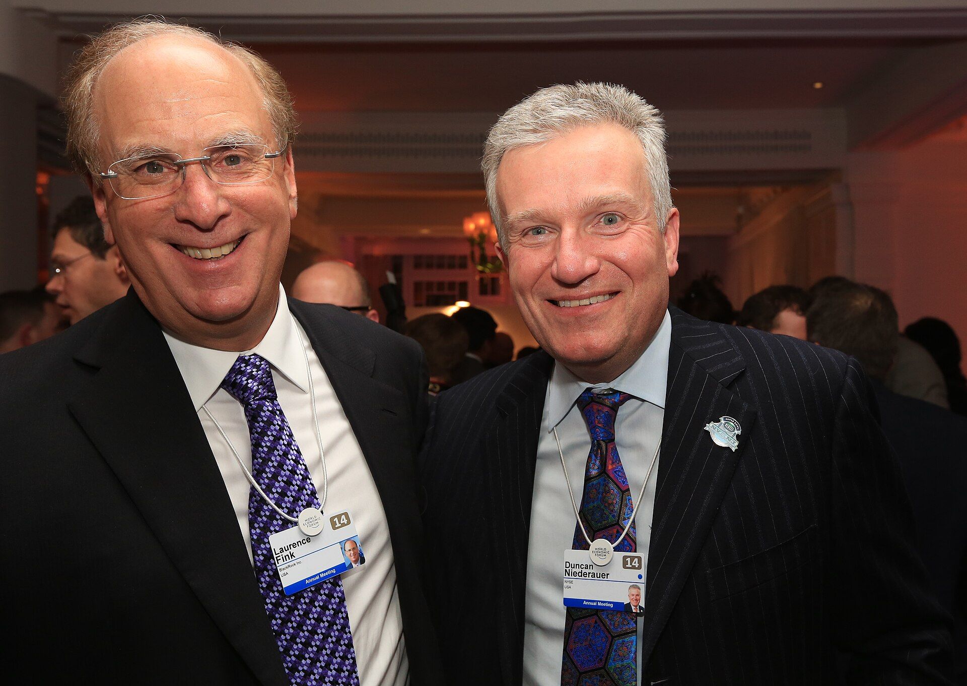 Larry Fink (ซ้าย) กับ Duncan Niederauer ในงาน FT CNBC Nightcap ที่ดาวอส ปี 2014